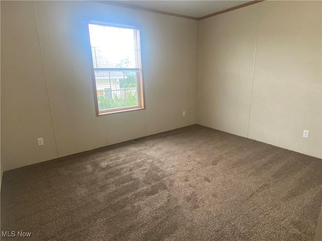 67330 Ebbert Rd Unit 9, Saint Clairsville, OH 43950 - carpeted spare room featuring crown molding