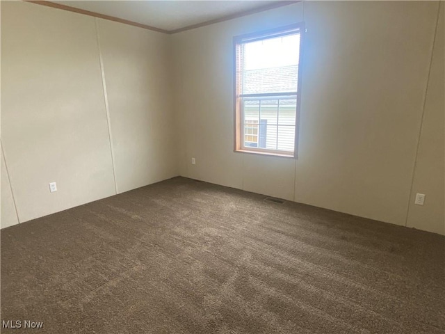 67330 Ebbert Rd Unit 9, Saint Clairsville, OH 43950 - carpeted empty room with crown molding