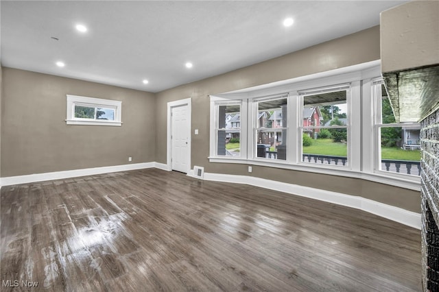 12616 Arlington Ave, Cleveland, OH 44108 - unfurnished living room featuring wood finished floors and recessed lighting
