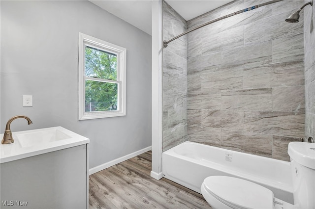 12616 Arlington Ave, Cleveland, OH 44108 - full bath featuring shower / washtub combination, vanity, and wood finished floors