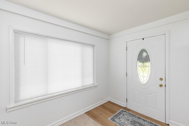 2830 Harmont Ave NE, Canton, OH 44705 - entryway featuring wood finished floors and baseboards