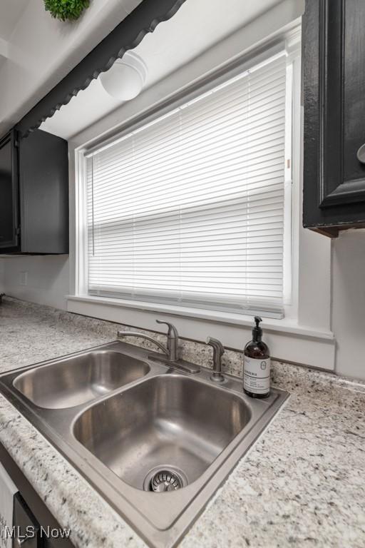 2830 Harmont Ave NE, Canton, OH 44705 - kitchen view of light countertops and dark cabinets