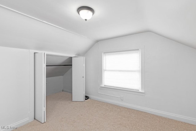 2830 Harmont Ave NE, Canton, OH 44705 - bonus room featuring vaulted ceiling and carpet