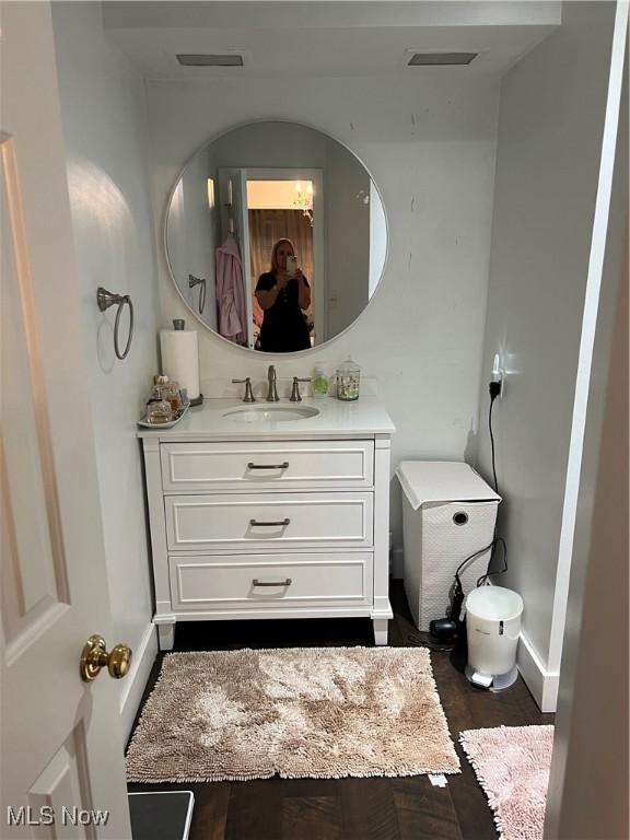 4389 Devonshire Dr, Boardman, OH 44512 - bathroom featuring vanity and wood finished floors