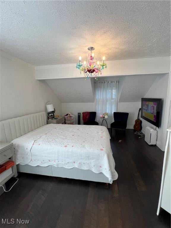 4389 Devonshire Dr, Boardman, OH 44512 - bedroom featuring a textured ceiling, wood finished floors, a chandelier, ornamental molding, and lofted ceiling