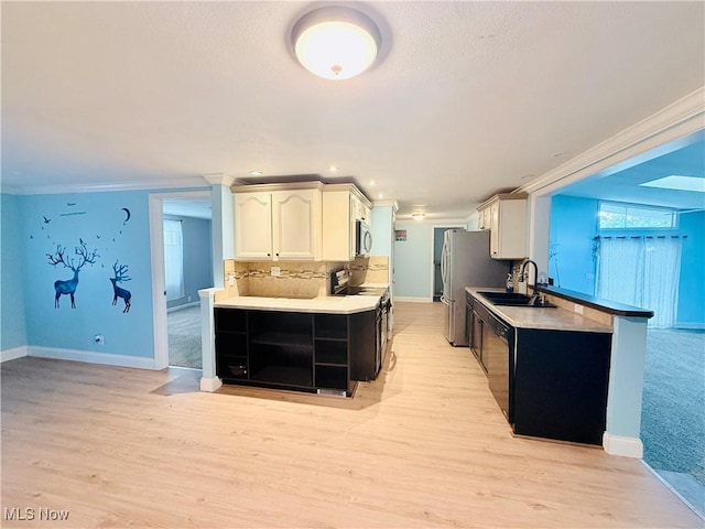 133 Walleye Ct, Lagrange, OH 44050 - kitchen featuring black appliances, ornamental molding, light wood-type flooring, backsplash, and light countertops