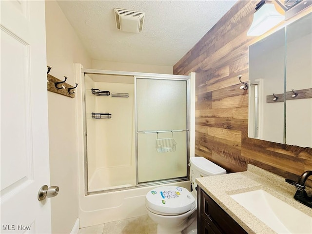 133 Walleye Ct, Lagrange, OH 44050 - bathroom with wooden walls, vanity, enclosed tub / shower combo, and a textured ceiling
