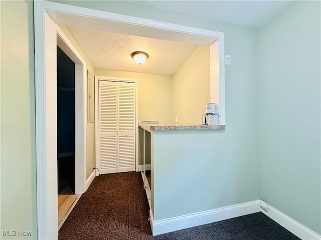 133 Walleye Ct, Lagrange, OH 44050 - hall featuring baseboards and dark carpet