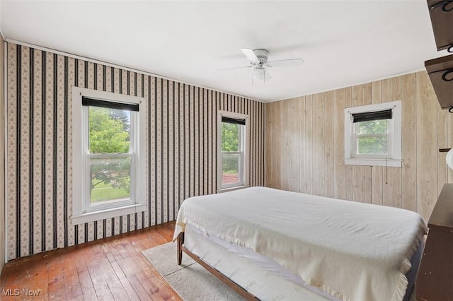 436 N Portage St, Doylestown, OH 44230 - bedroom featuring hardwood / wood-style flooring, multiple windows, and a ceiling fan