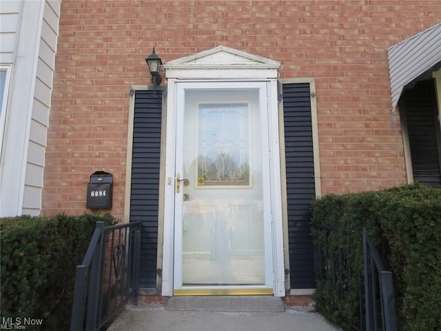 6094 Andover Blvd Unit 3, Garfield Heights, OH 44125 - view of exterior entry with brick siding