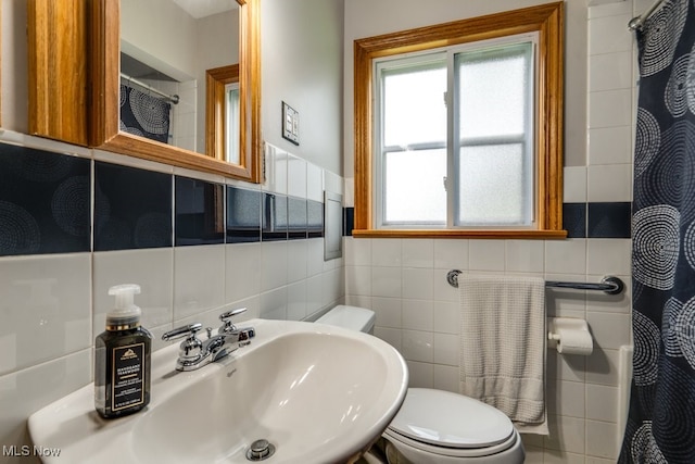 11339 Ridge Rd, North Royalton, OH 44133 - full bathroom with tile walls and curtained shower