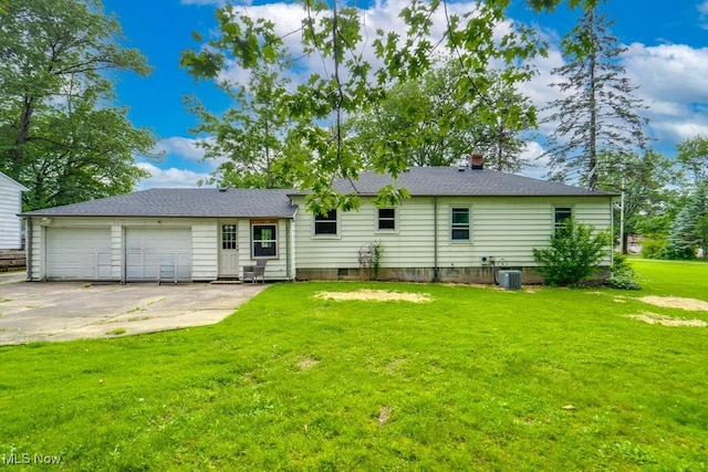 11339 Ridge Rd, North Royalton, OH 44133 - rear view of house featuring a lawn and driveway