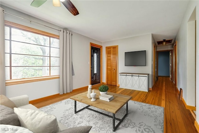 11339 Ridge Rd, North Royalton, OH 44133 - living area with light wood-style flooring and a ceiling fan