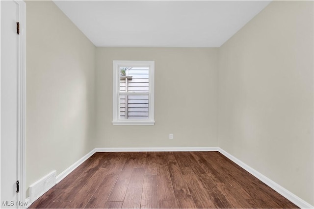 416 E 255th St, Euclid, OH 44132 - unfurnished room with dark wood-style flooring and baseboards