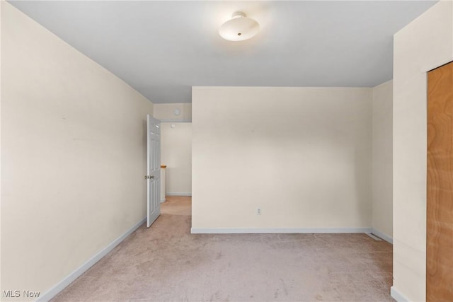 3480 Central Ave, Shadyside, OH 43947 - spare room featuring light carpet and baseboards