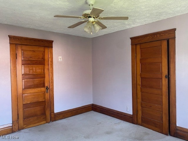 104 Jefferson St, Belmont, OH 43718 - unfurnished room with light colored carpet, a textured ceiling, and ceiling fan