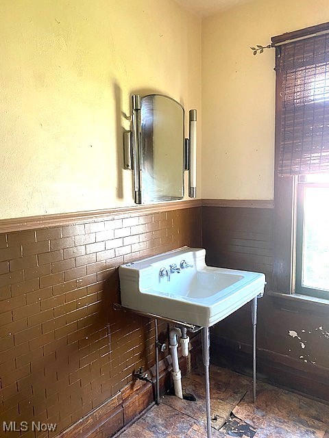 104 Jefferson St, Belmont, OH 43718 - bathroom with a wainscoted wall and stone finish flooring