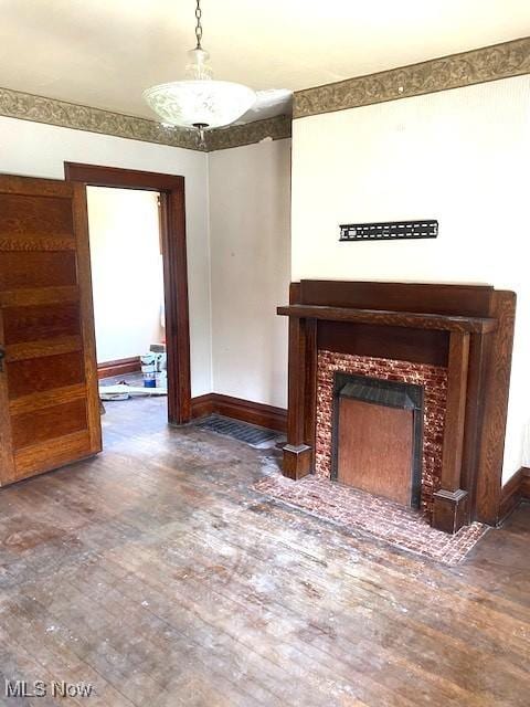 104 Jefferson St, Belmont, OH 43718 - unfurnished living room with a fireplace with flush hearth and wood finished floors