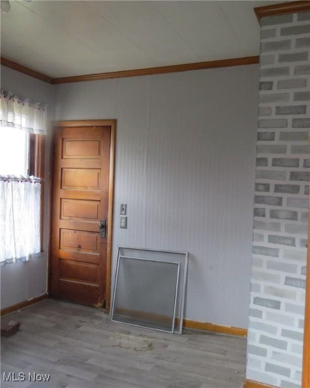 104 Jefferson St, Belmont, OH 43718 - spare room with crown molding and wood finished floors
