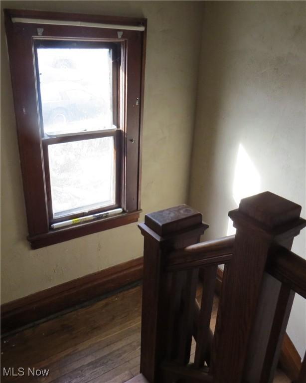104 Jefferson St, Belmont, OH 43718 - staircase with wood finished floors and healthy amount of natural light