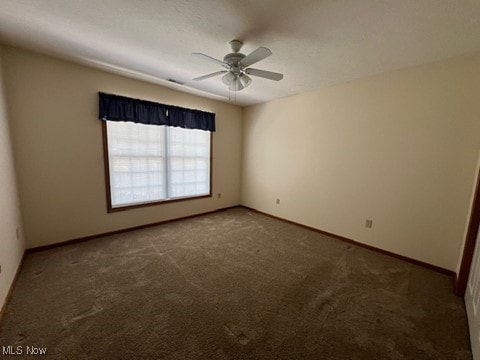 2132 University Commons Dr SE, Massillon, OH 44646 - empty room featuring ceiling fan and carpet flooring
