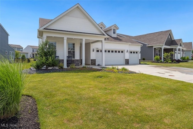 23761 St Andrews Dr, Columbia Station, OH 44028 - view of front of home with an attached garage, driveway, a front yard, and stone siding