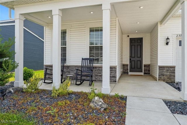 23761 St Andrews Dr, Columbia Station, OH 44028 - property entrance featuring stone siding and covered porch