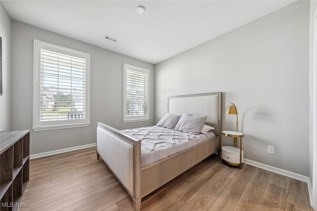 23761 St Andrews Dr, Columbia Station, OH 44028 - bedroom featuring light wood finished floors and baseboards