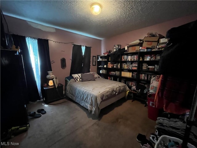 2455 W 7th St, Cleveland, OH 44113 - carpeted bedroom with a textured ceiling