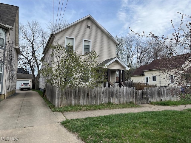 2455 W 7th St, Cleveland, OH 44113 - view of front of property featuring a garage and an outdoor structure