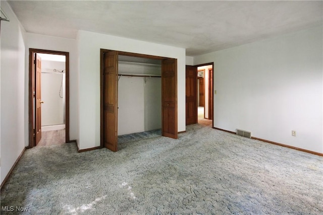 8630 Williams Rd, Chardon, OH 44024 - unfurnished bedroom featuring light carpet and a closet