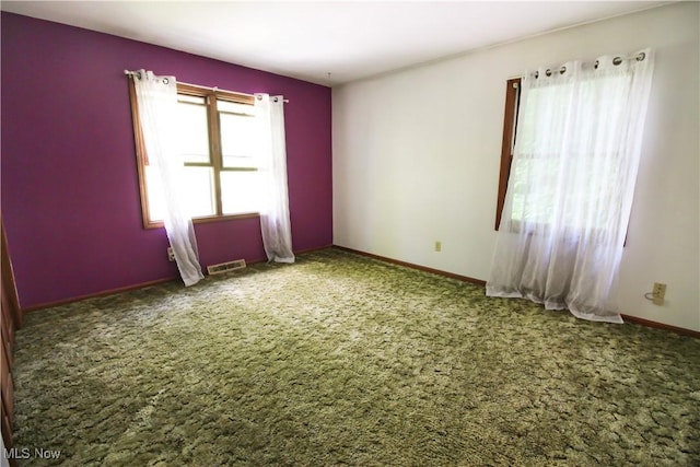 8630 Williams Rd, Chardon, OH 44024 - carpeted spare room featuring baseboards