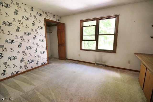 8630 Williams Rd, Chardon, OH 44024 - unfurnished bedroom with light carpet and a closet