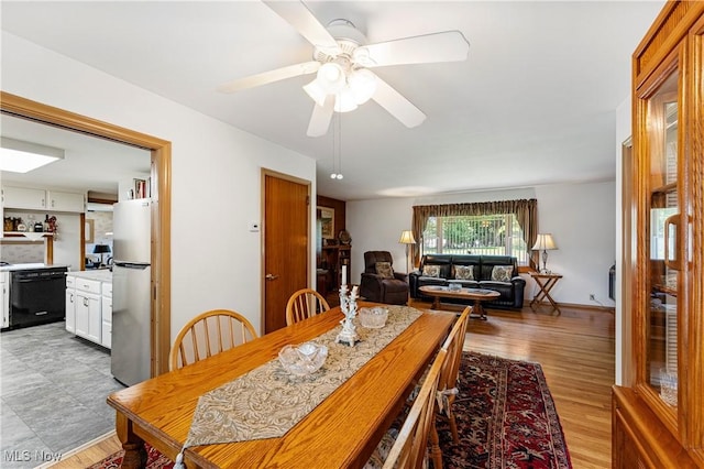 218 Bonnett St SW, North Canton, OH 44720 - dining space featuring ceiling fan and light wood finished floors