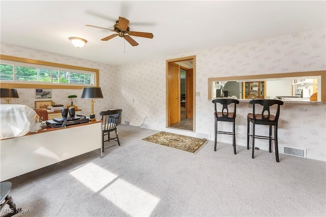 218 Bonnett St SW, North Canton, OH 44720 - home office featuring wallpapered walls, carpet, and a ceiling fan