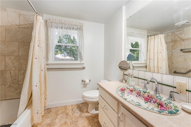 218 Bonnett St SW, North Canton, OH 44720 - bathroom with vanity and shower / bath combo