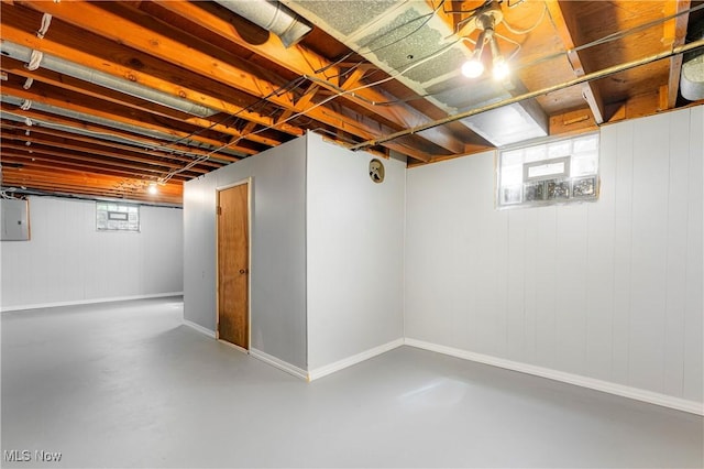 218 Bonnett St SW, North Canton, OH 44720 - basement with baseboards and electric panel