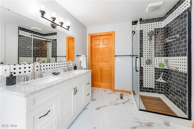 218 Bonnett St SW, North Canton, OH 44720 - full bathroom featuring marble look tile flooring, a shower stall, and double vanity