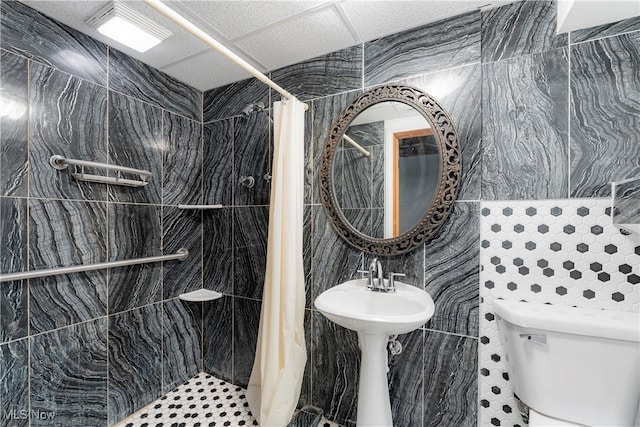 218 Bonnett St SW, North Canton, OH 44720 - full bath with tiled shower and tile walls