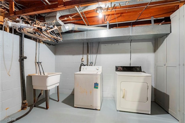 218 Bonnett St SW, North Canton, OH 44720 - unfinished basement with washer and dryer and concrete block wall