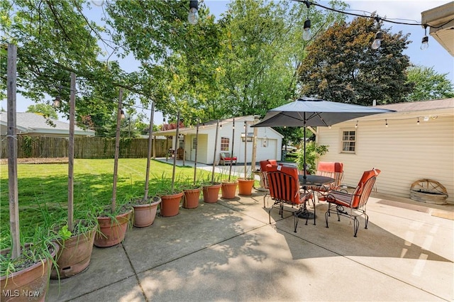 218 Bonnett St SW, North Canton, OH 44720 - view of patio / terrace with an outdoor structure and outdoor dining area