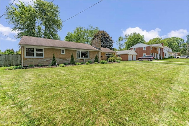 218 Bonnett St SW, North Canton, OH 44720 - back of house with a chimney and stone siding