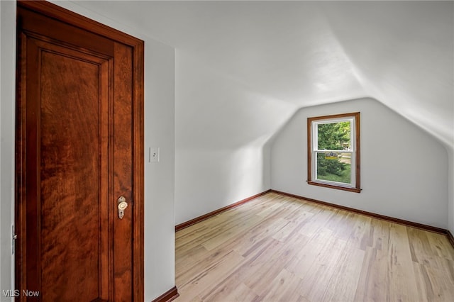 416 N Hambden St, Chardon, OH 44024 - additional living space with light wood finished floors and vaulted ceiling