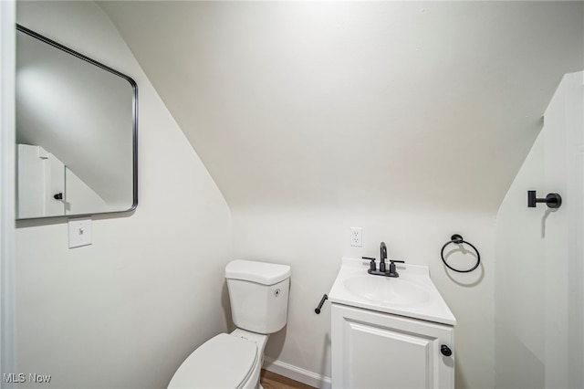 416 N Hambden St, Chardon, OH 44024 - bathroom featuring vanity and lofted ceiling
