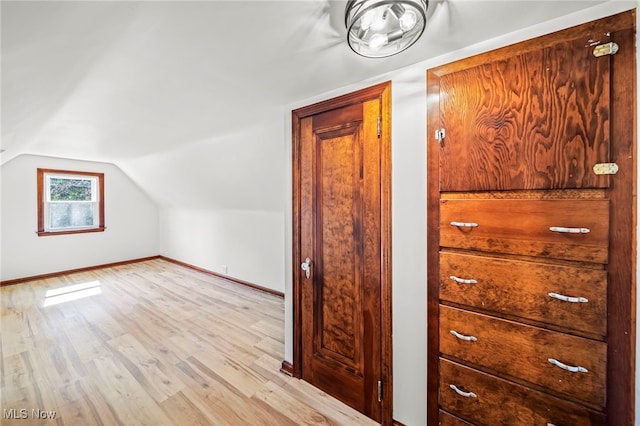 416 N Hambden St, Chardon, OH 44024 - bonus room featuring light wood-type flooring and vaulted ceiling