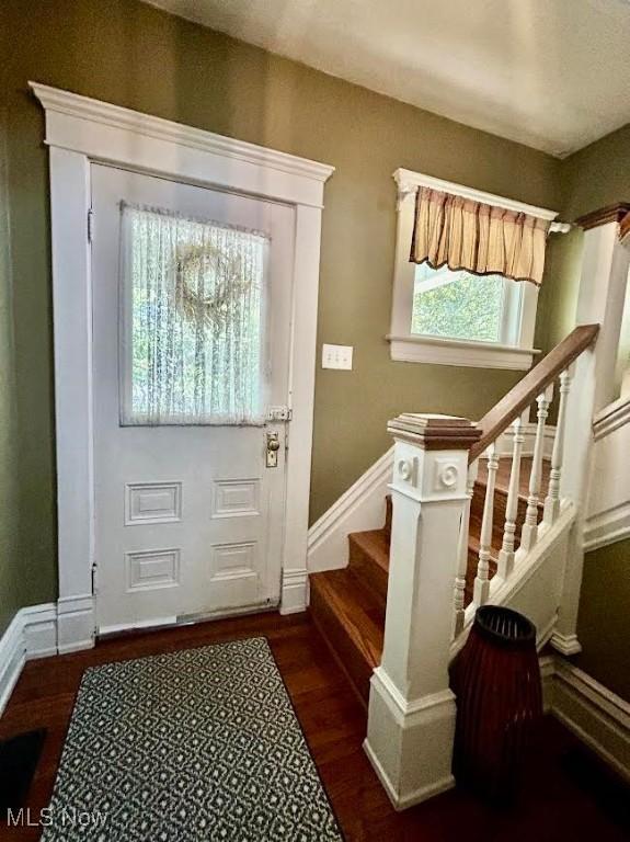 623 N 7th St, Marietta, OH 45750 - foyer with stairs and wood finished floors
