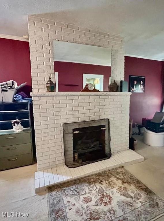 623 N 7th St, Marietta, OH 45750 - detailed view of a fireplace, crown molding, and a textured ceiling