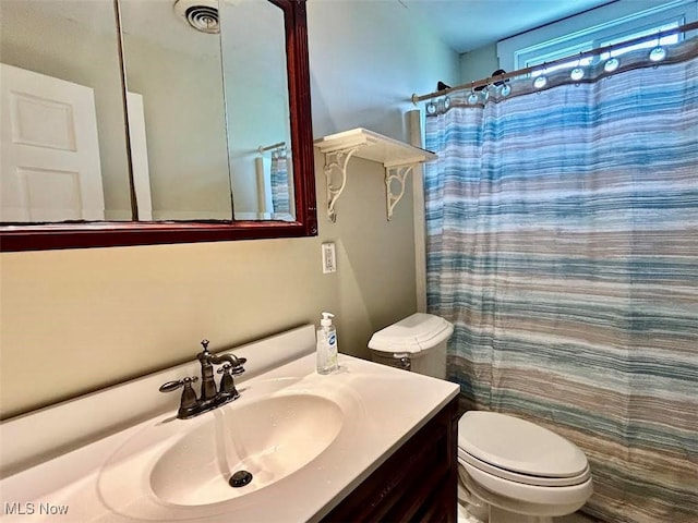 623 N 7th St, Marietta, OH 45750 - bathroom with vanity and a shower with shower curtain
