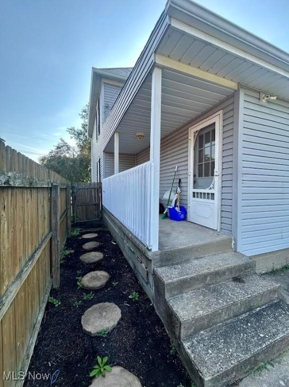 623 N 7th St, Marietta, OH 45750 - view of side of home with a porch