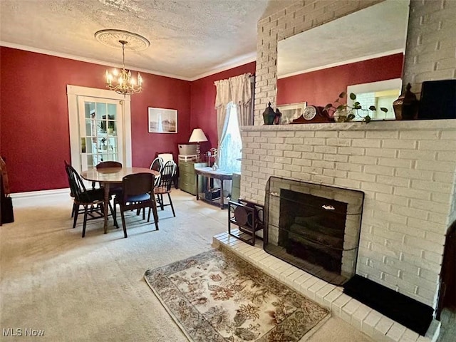 623 N 7th St, Marietta, OH 45750 - carpeted dining space featuring a textured ceiling, a chandelier, crown molding, and a brick fireplace